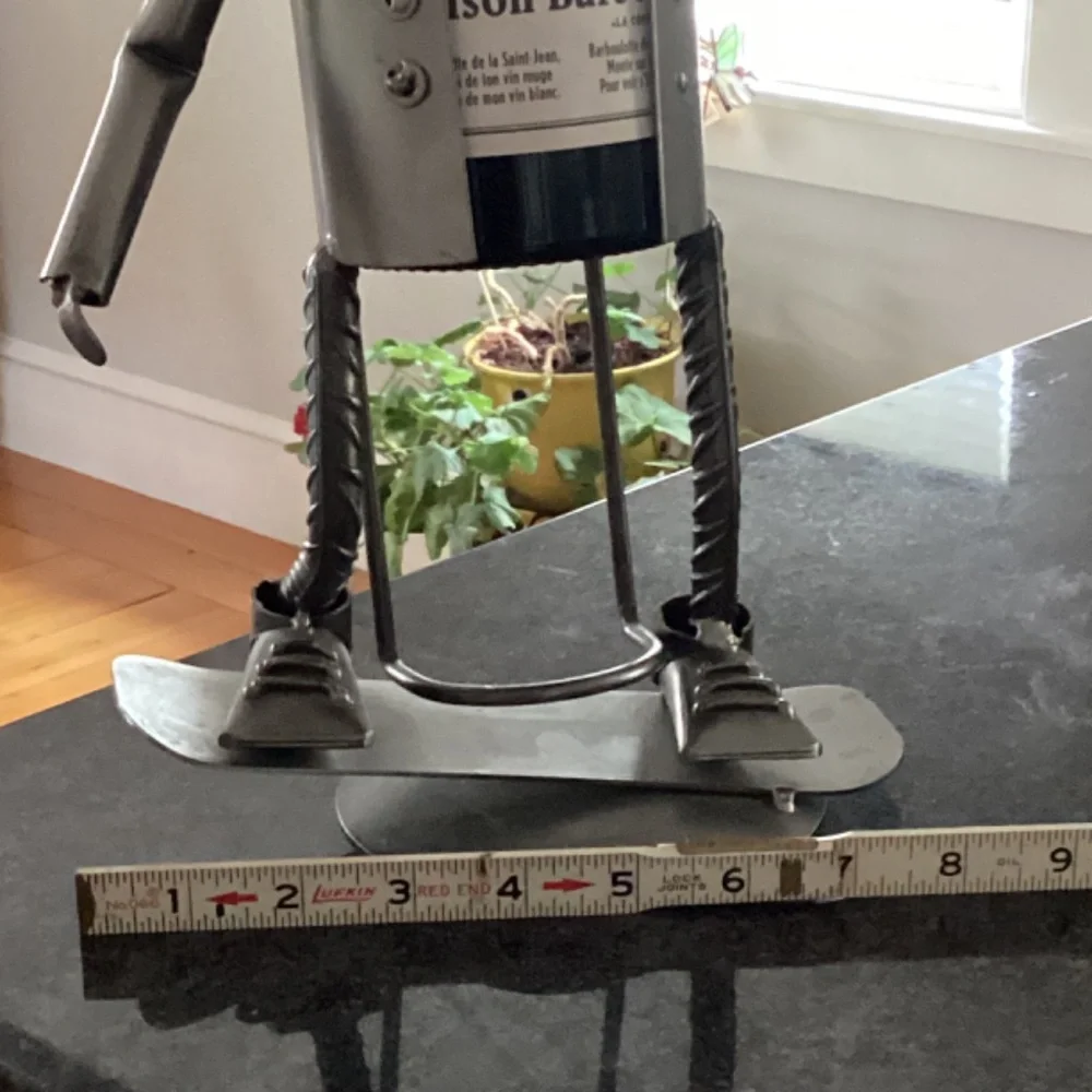 Wine bottle holder H & K steel on person on Skateboard?